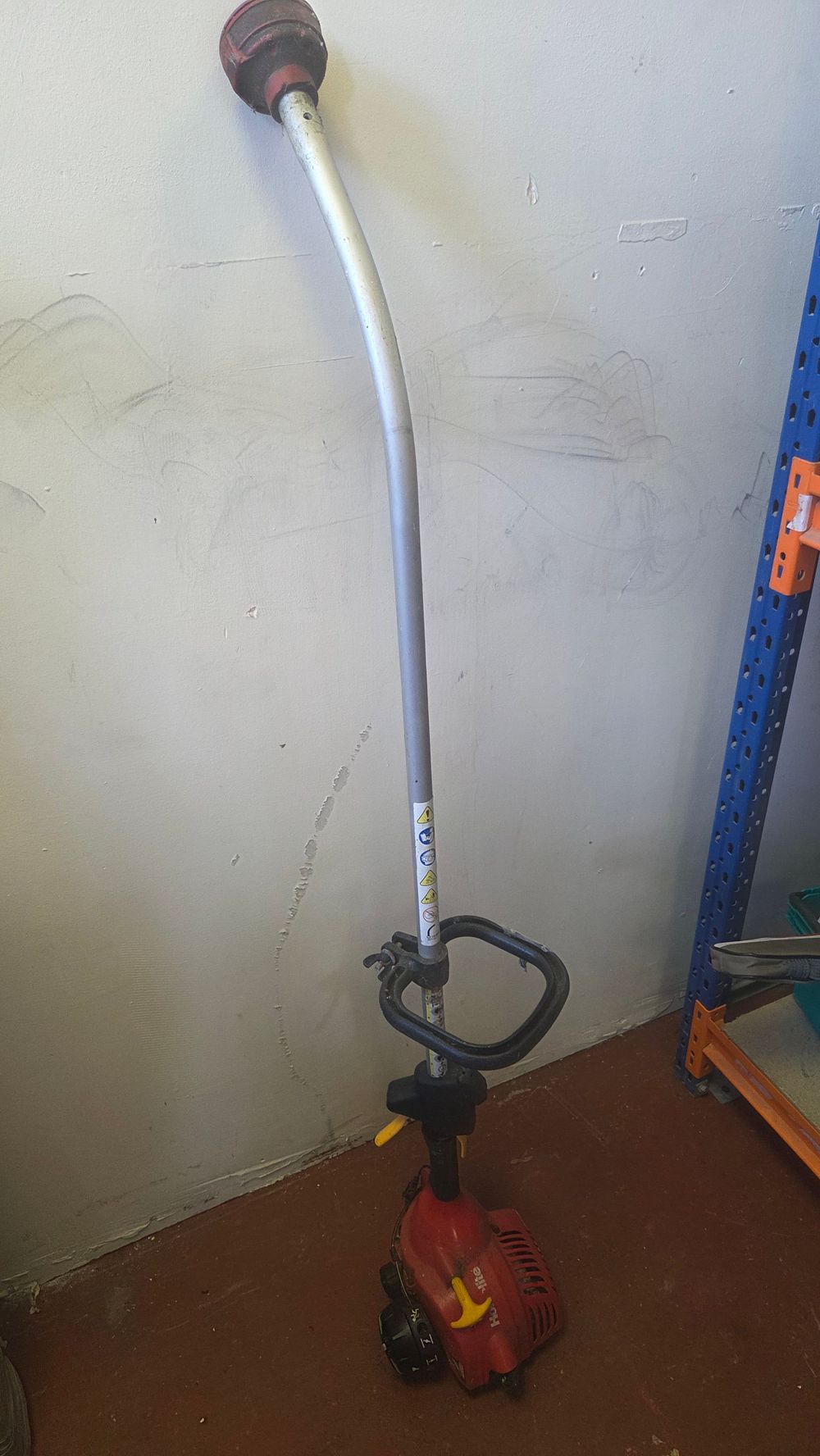 Lot 249 – Homelite Petrol-Powered Curved Shaft String Trimmer