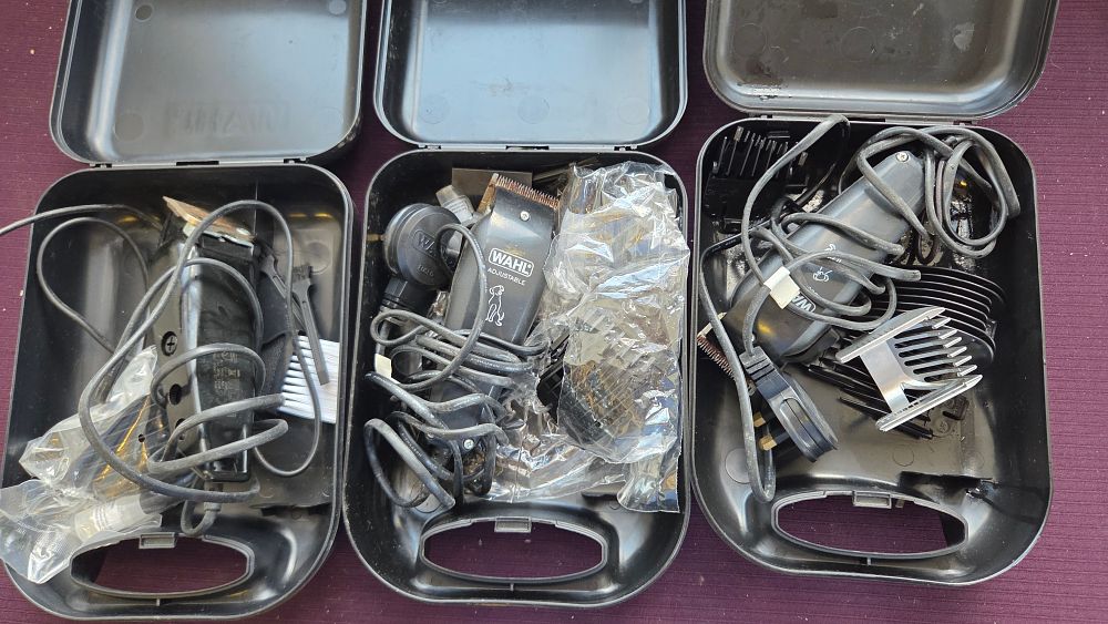 Lot 297 – A Trio of Wahl Corded Electric Grooming Clippers with Accessories and Carry Cases