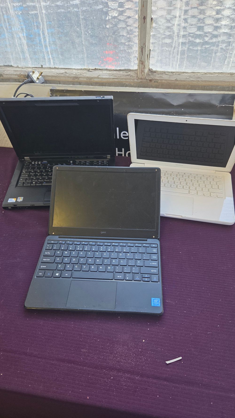 Lot 336 – Three Laptops including Apple MacBook and Geo GeoBook Models