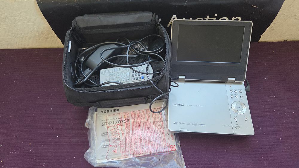 Lot 337 – Toshiba SD-P1707 Portable DVD Player and an Assortment of Accessories