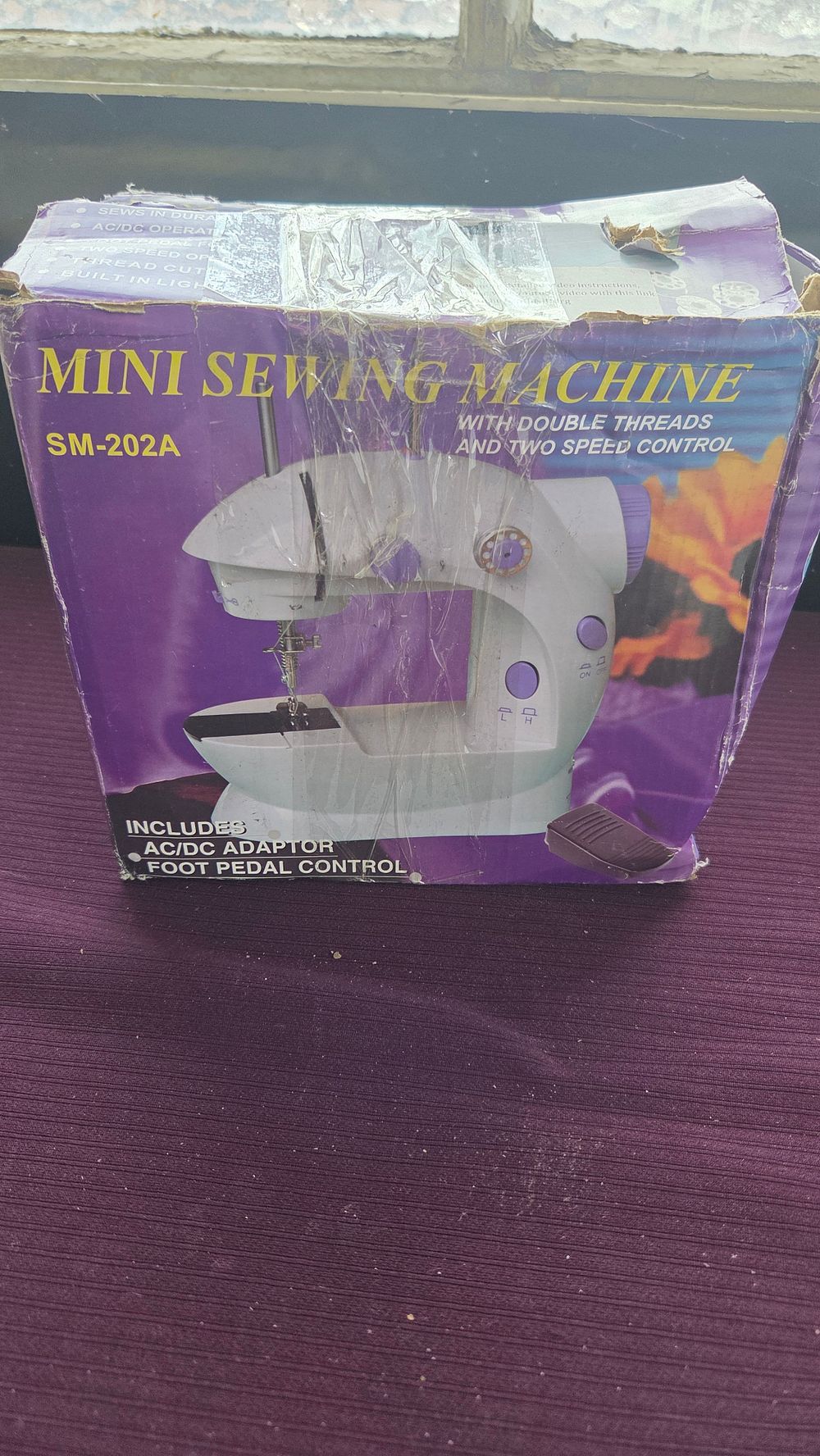 Lot 166 – Portable Mini Sewing Machine Model SM-202A
