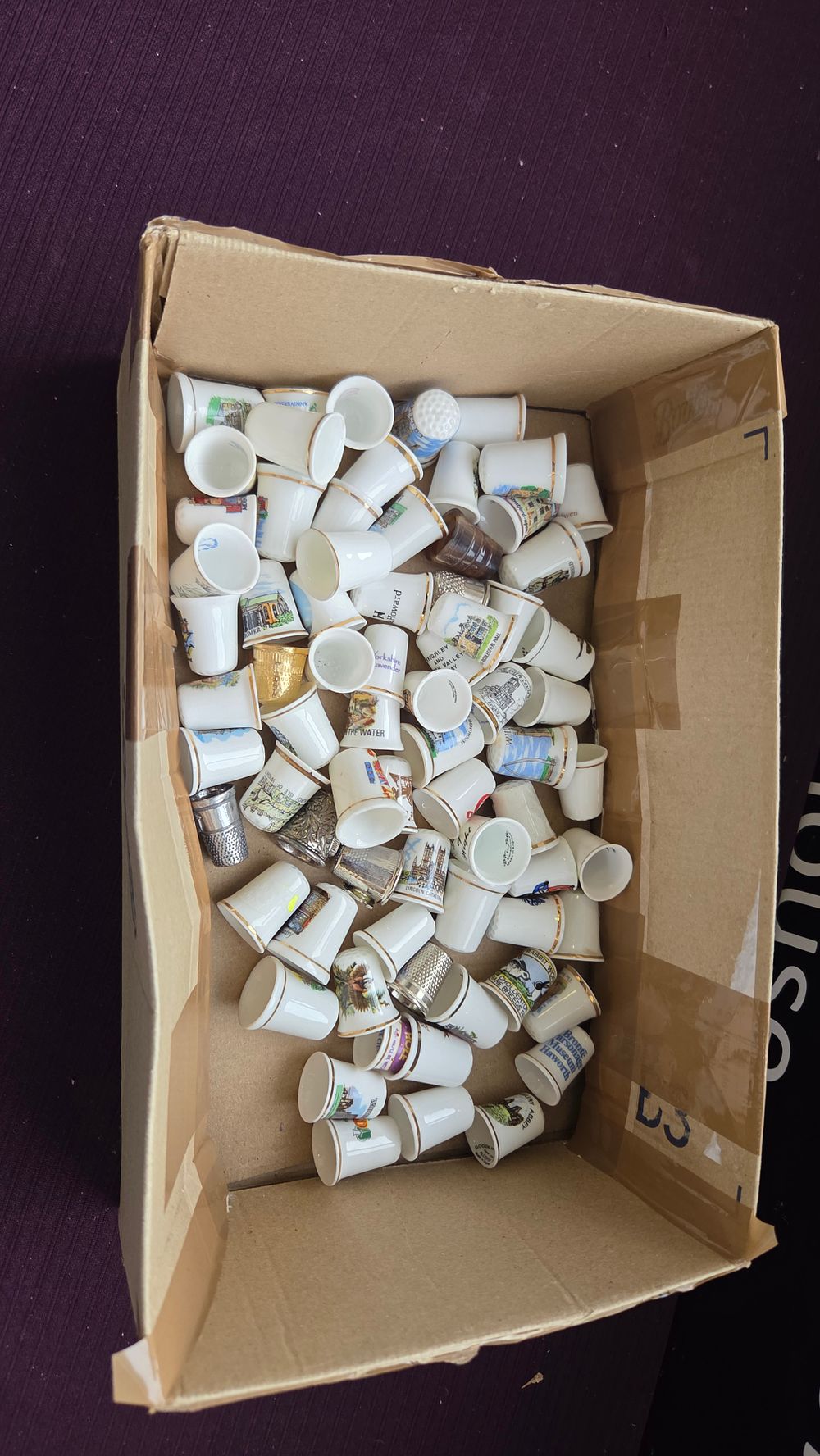 Lot 220 – A Collection of Ceramic and Metal Souvenir Thimbles