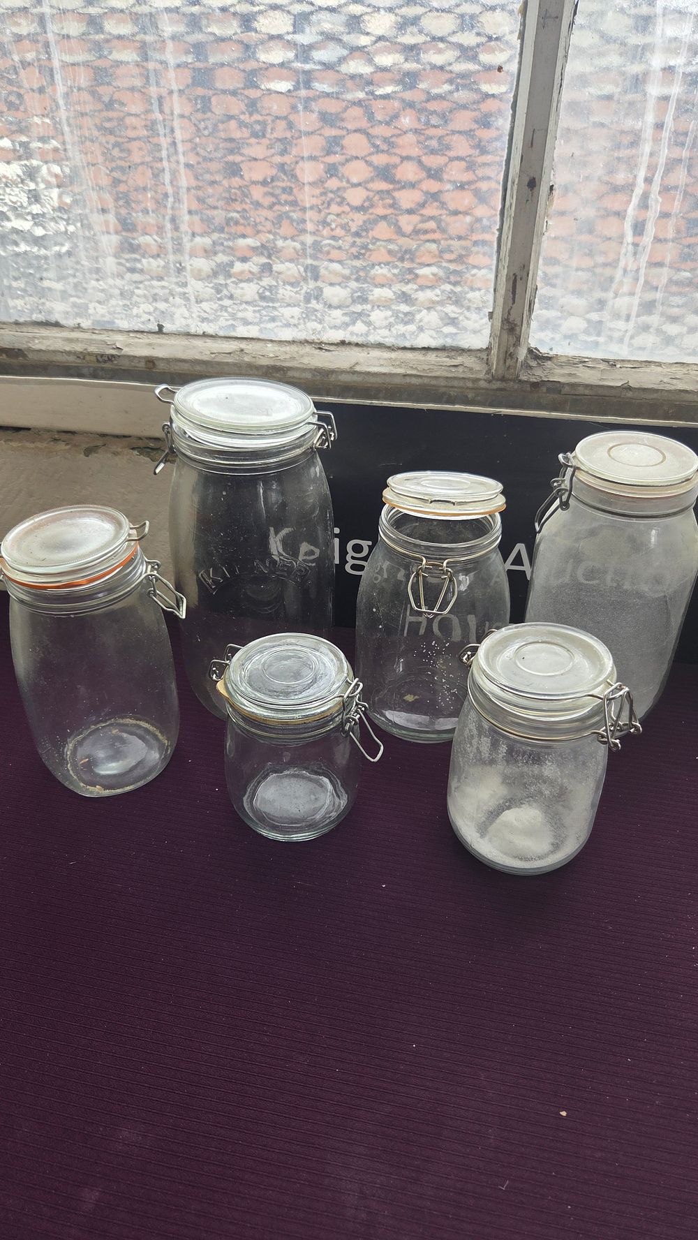 Lot 221 – A Collection of Clear Glass Storage Jars Including Kilner Examples