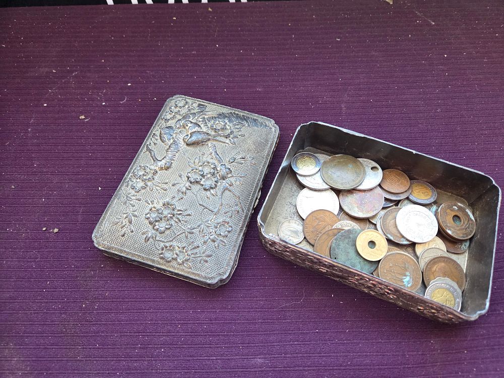 Lot 603 – A Collection of International and UK Coins in a Repoussé Metal Box