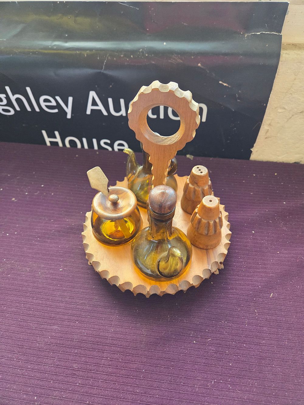 Lot 611 – A Collection of Mid-Century Modern Condiment Vessels on a Circular Wooden Stand