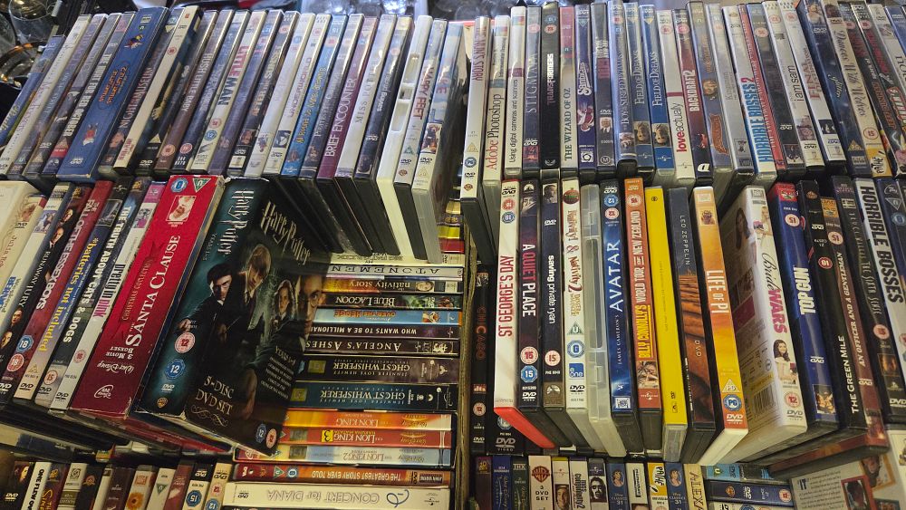 Lot 158 – Two Boxes of DVD Movies, Television Series, and Box Sets