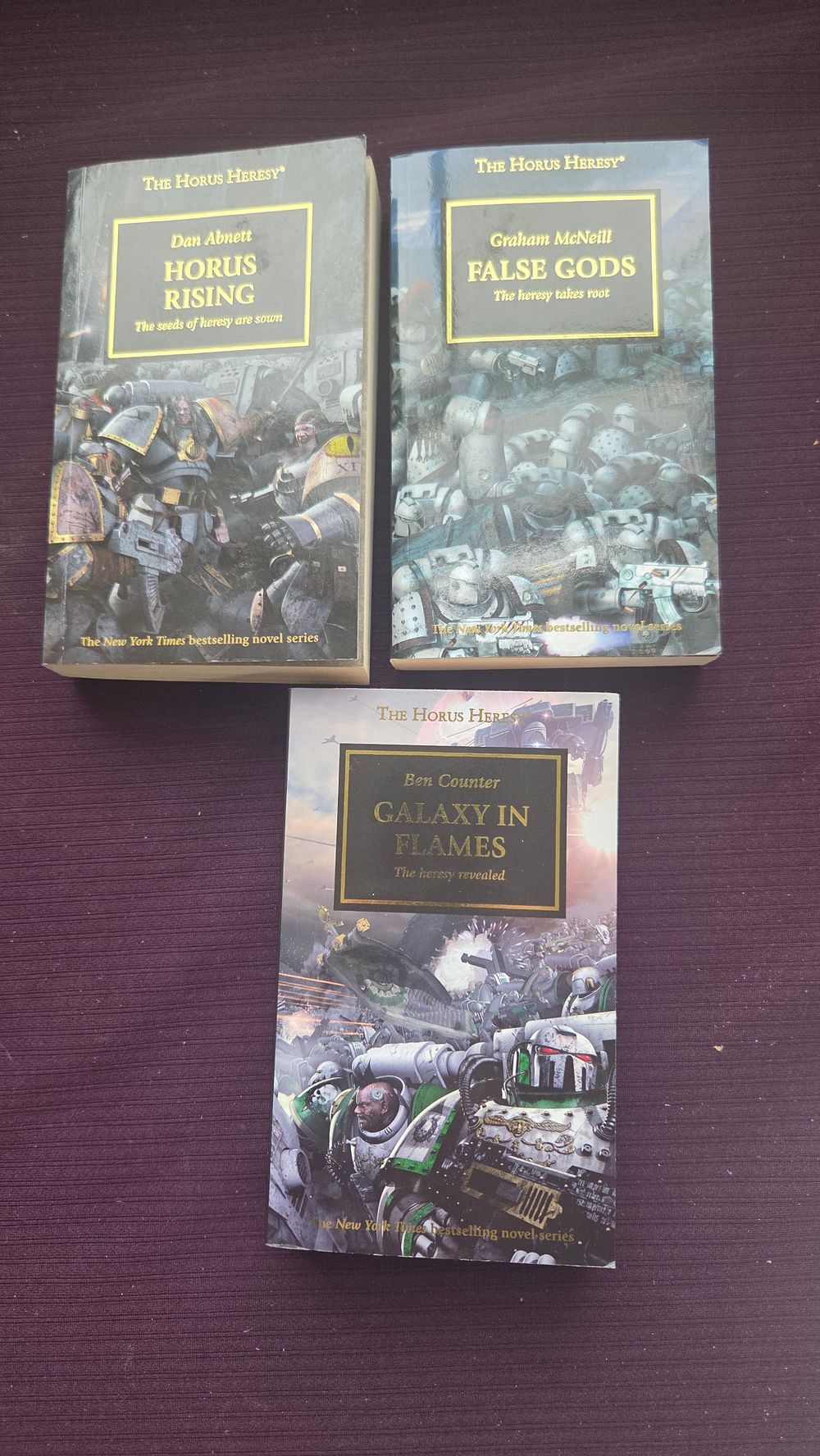 Lot 212 – Abnett, McNeill, & Counter. Three Volumes from The Horus Heresy Series. Black Library.