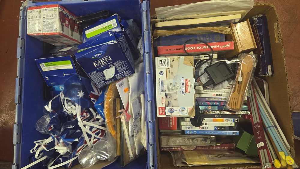 Lot 215 – Two Boxes of Mixed Household Goods, Personal Care Products, Media, and Electronics