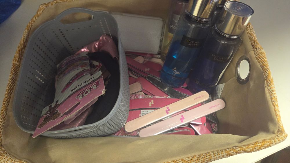 Lot 220 – A Collection of Personal Care and Beauty Products Including Victoria’s Secret Fragrance Mists and L.O.L. Surprise Hair Accessories