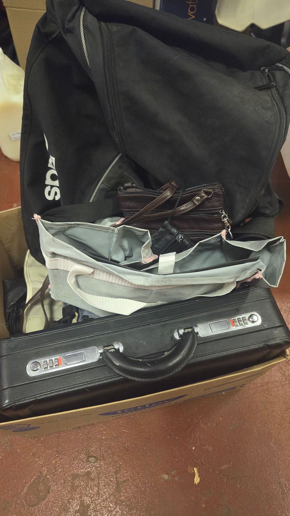 Lot 221 – An Assortment of Luggage and Travel Bags including an Adidas Holdall and Hard-Shell Briefcase