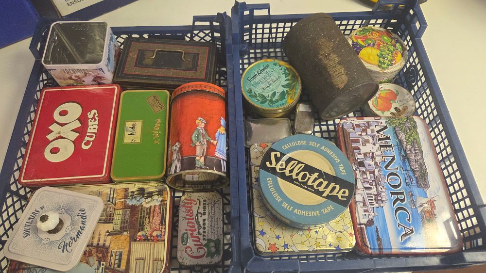 Lot 243 – Two Baskets of Vintage Advertising and Souvenir Tins