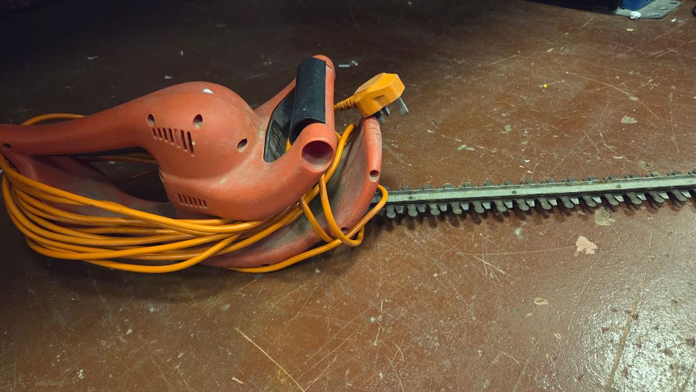 Lot 293 – An Electric Hedge Trimmer with Integrated Power Cable