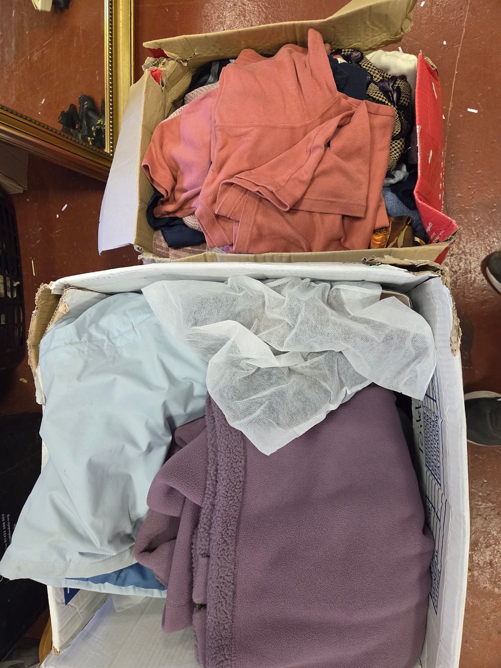 Lot 298 – Two Boxes of Clothes