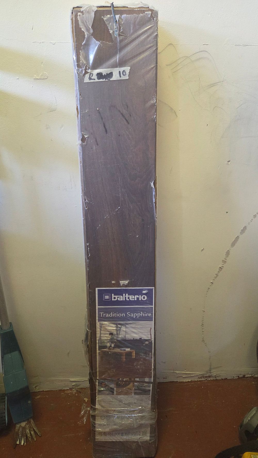Lot 373 – A Pack of Balterio Tradition Sapphire Dark Wood Effect Laminate Flooring