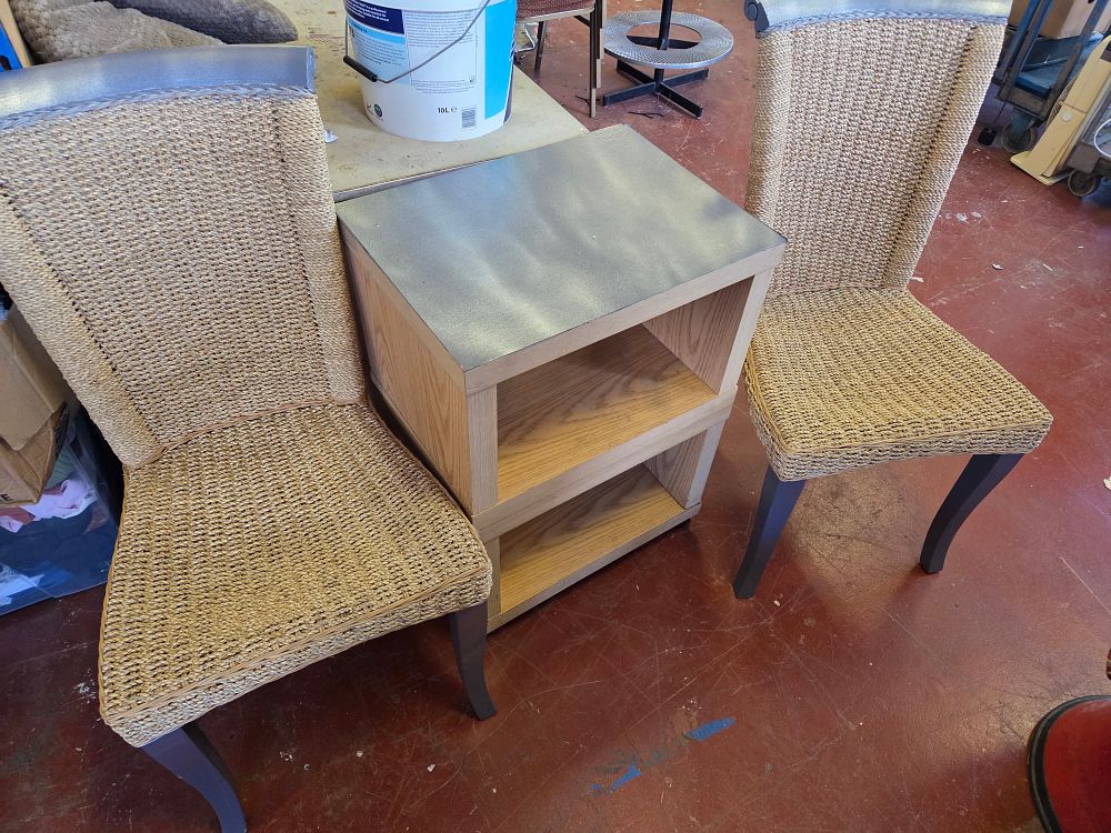 Lot 379 – A pair of Bali and Pari Anfield natural seagrass dining chairs and a contemporary two-tier wooden side table