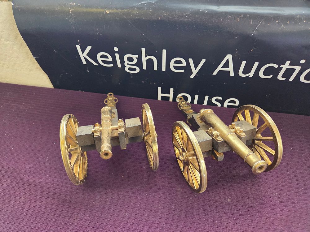 Lot 629 – A Pair of Miniature Decorative Brass and Metal Field Cannons