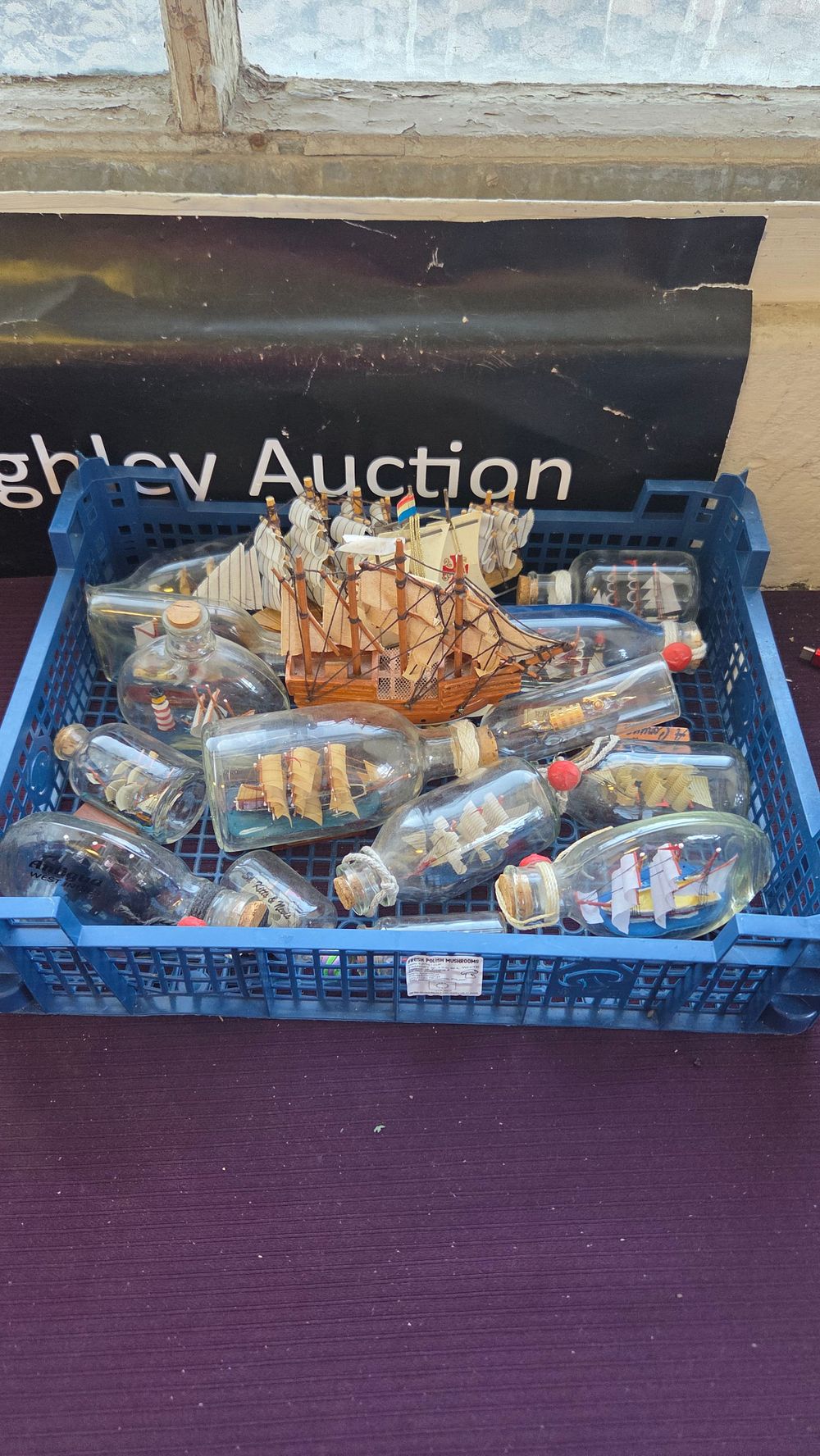 Lot 154 – A Collection of Maritime-Themed Decorative Items Including Multiple Ships in Bottles and a Free-Standing Wooden Model Ship