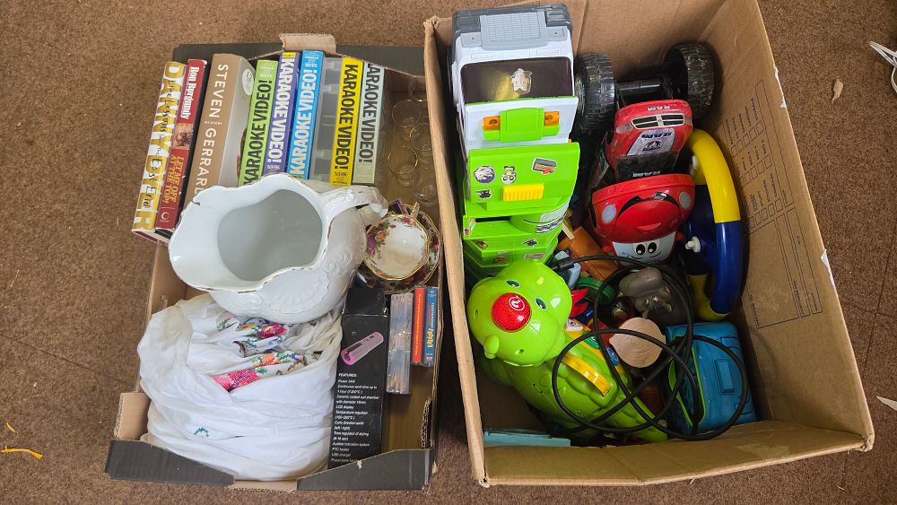 Lot 180 – Two Boxes of Household Goods, Media, and Plastic Toys