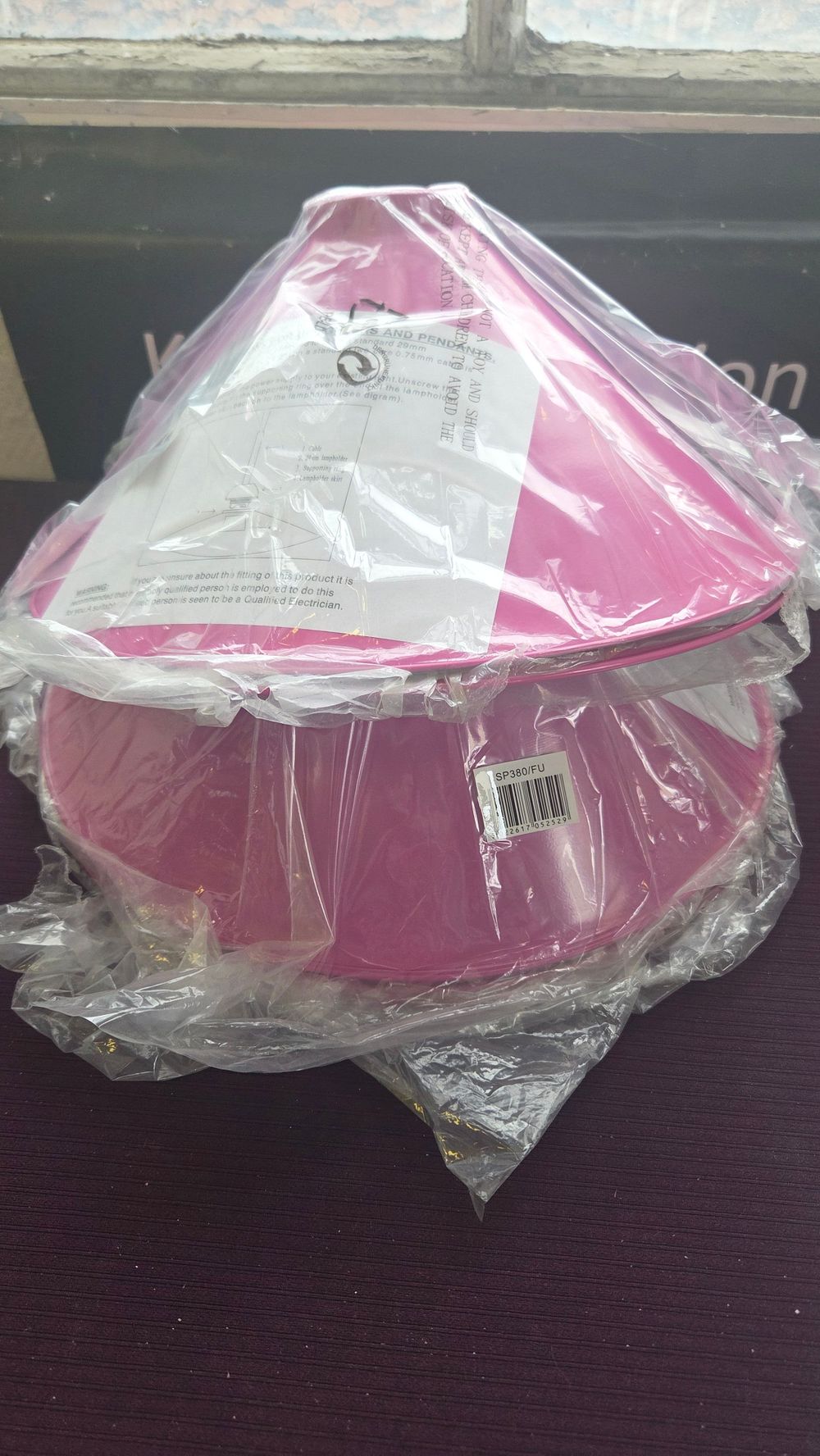 Lot 201 – A Set of Five Pink Enamelled Metal Conical Lamp Shades