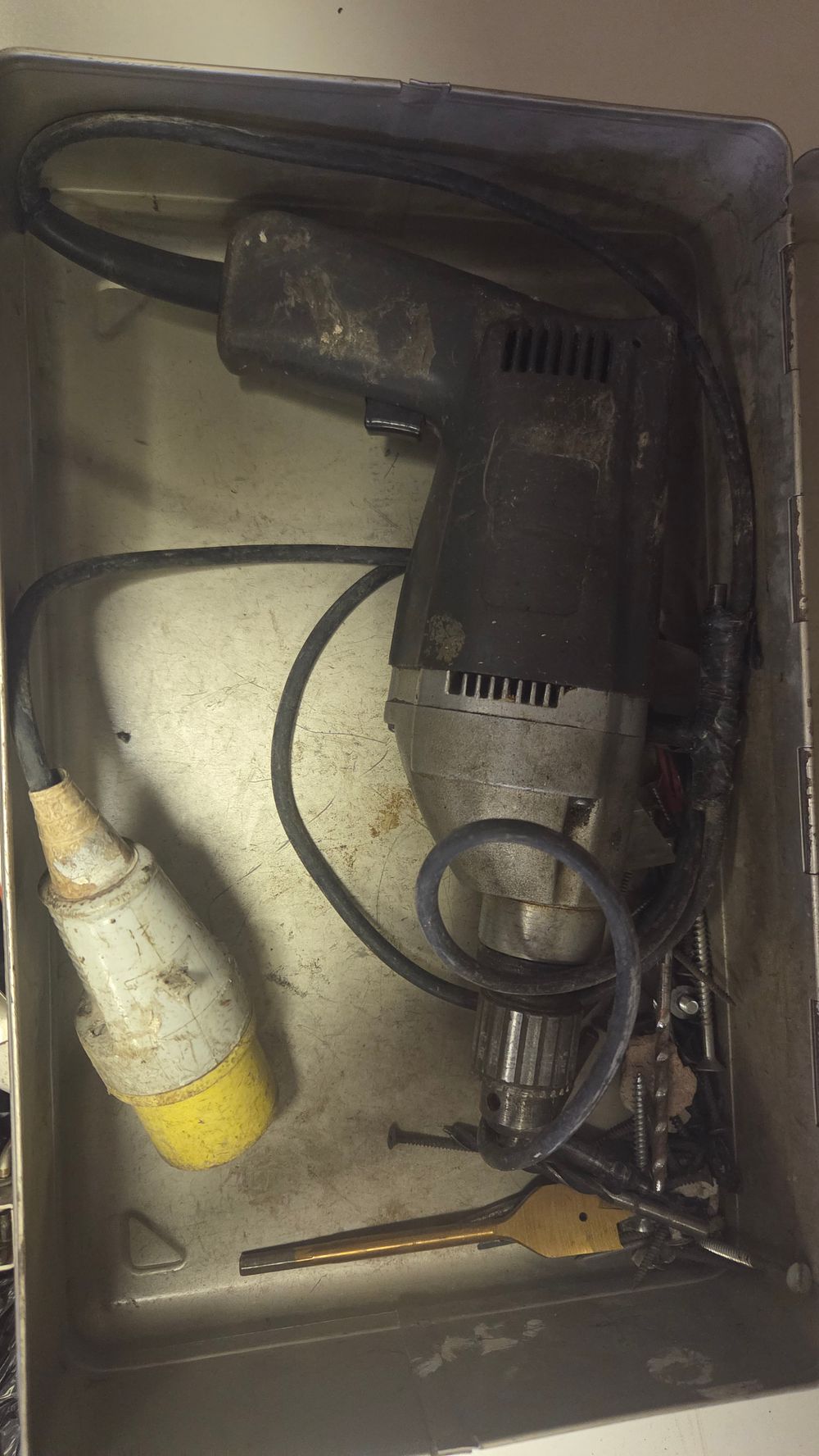 Lot 221 – A Vintage Corded Electric Power Drill in a Metal Carry Case with Accessories
