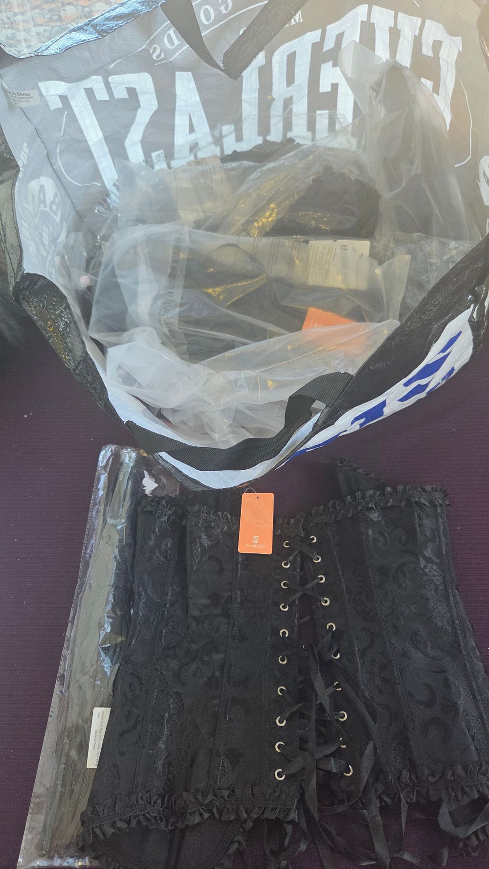Lot 268 – An Assortment of FeelinGirl Performance Costume Corsets and Faux Leather Flogger