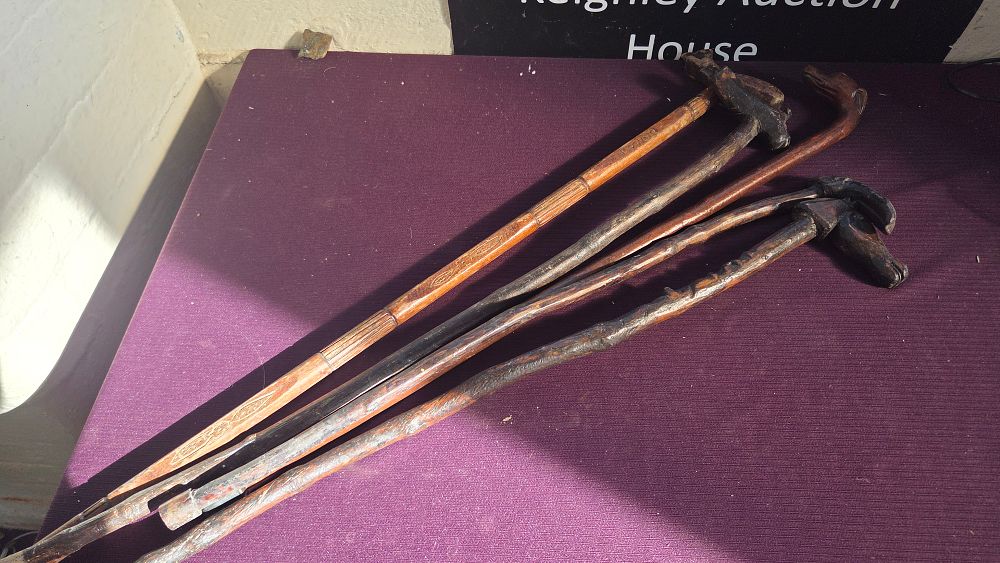 Lot 358 – A Group of Five Late 19th or Early 20th Century Folk Art Carved Wooden Walking Sticks