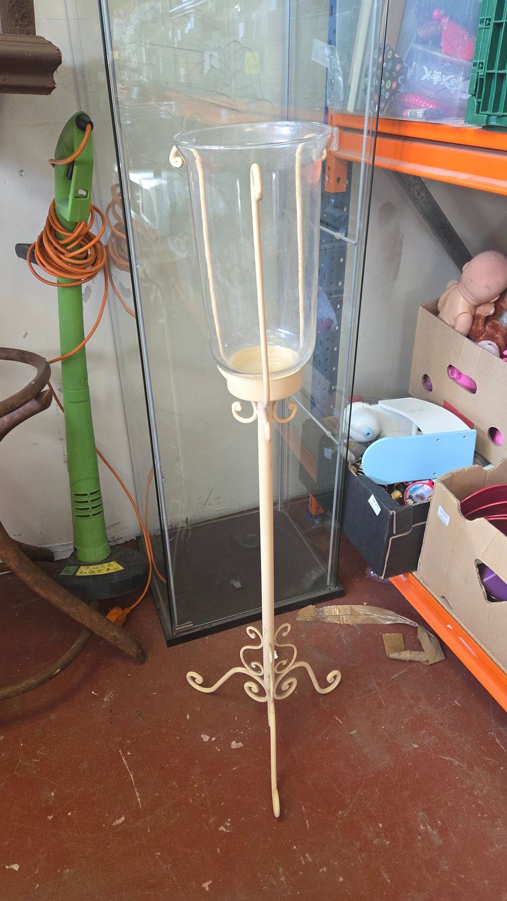 Lot 383 – A cream-painted metal floor-standing hurricane lantern