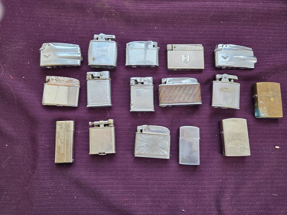 Lot 611 – A Collection of Vintage and Antique Metal Pocket Lighters including Ronson and Tobacco Advertising Examples