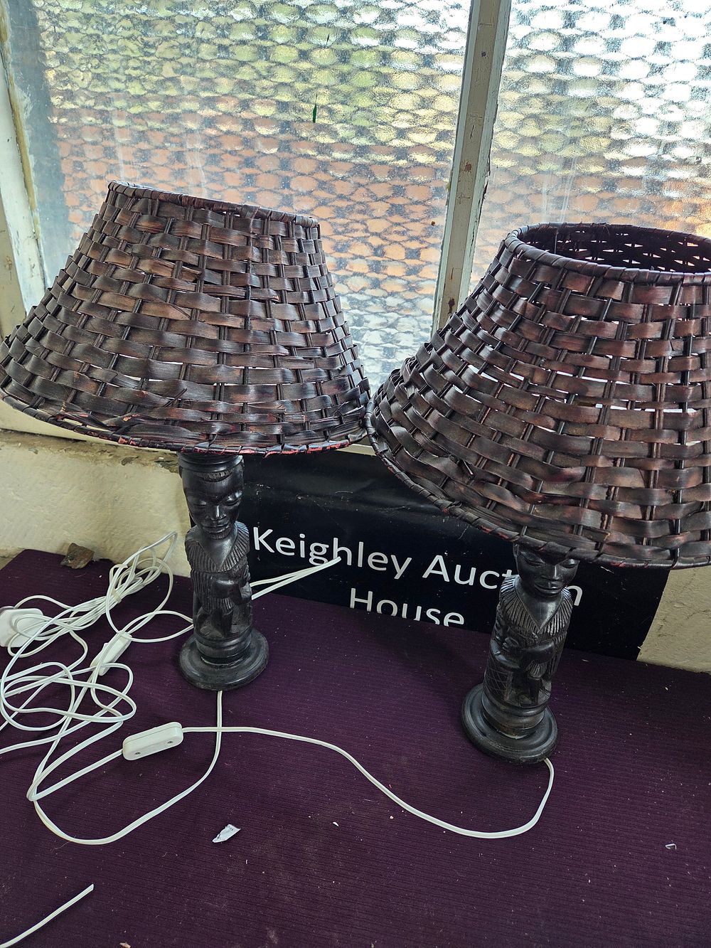 Lot 392 – A Pair of Mid-20th Century Hand-Carved African Hardwood Figurative Table Lamps