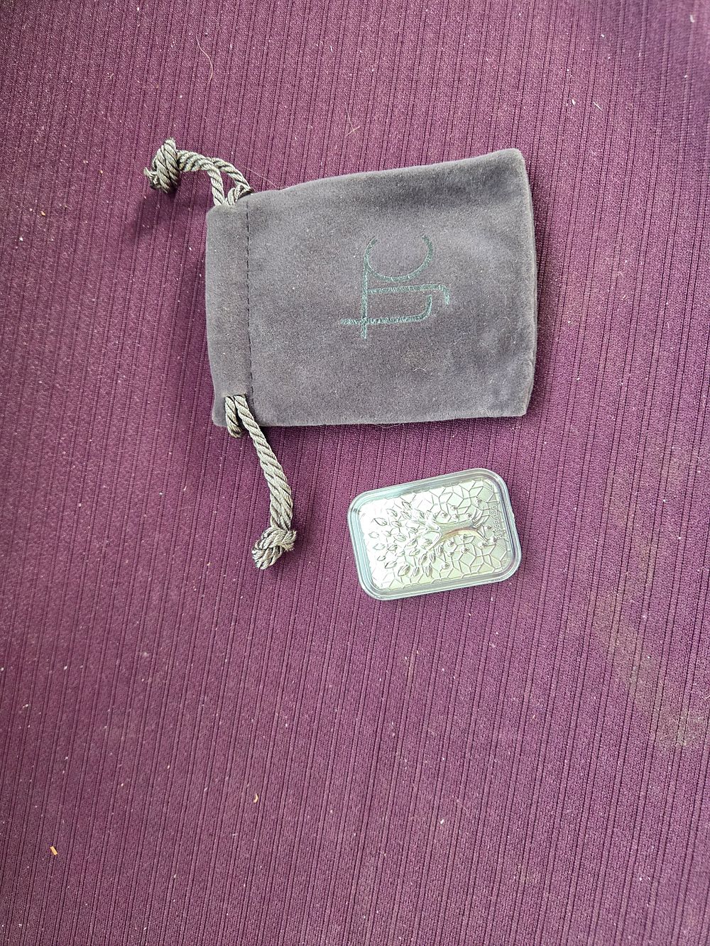 Lot 638 – A 999 White Platinum Tree of Life Bar by TJC