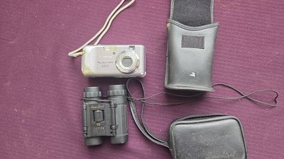 A Canon PowerShot A410 Compact Digital Camera and Laser Lens 8X21DN Binoculars with Cases