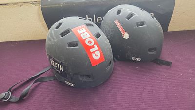 A Pair of Bullet Deluxe Multi-Sport Safety Helmets