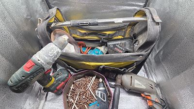 An Assortment of Power Tools and Accessories Including Bosch, Tesco, and Einhell in a Stanley 