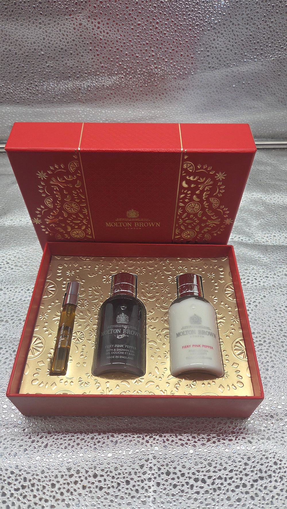Lot 198 – A Trio of Molton Brown Fiery Pink Pepper Toiletry Items in a Presentation Box
