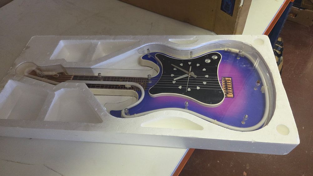 Lot 268 – Novelty Electric Guitar Shaped Wall Clock with Neon Style Lighting