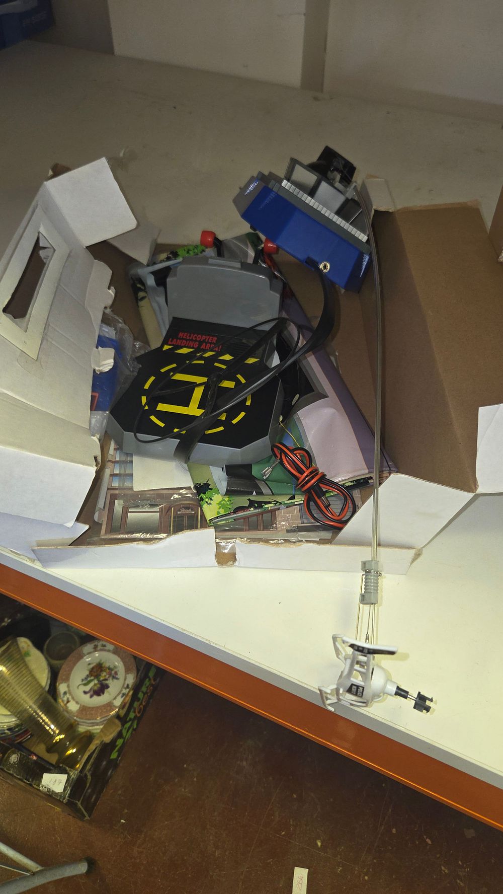 Lot 276 – Vintage Tethered Electric Toy Police Helicopter Set with Landing Pad and Box