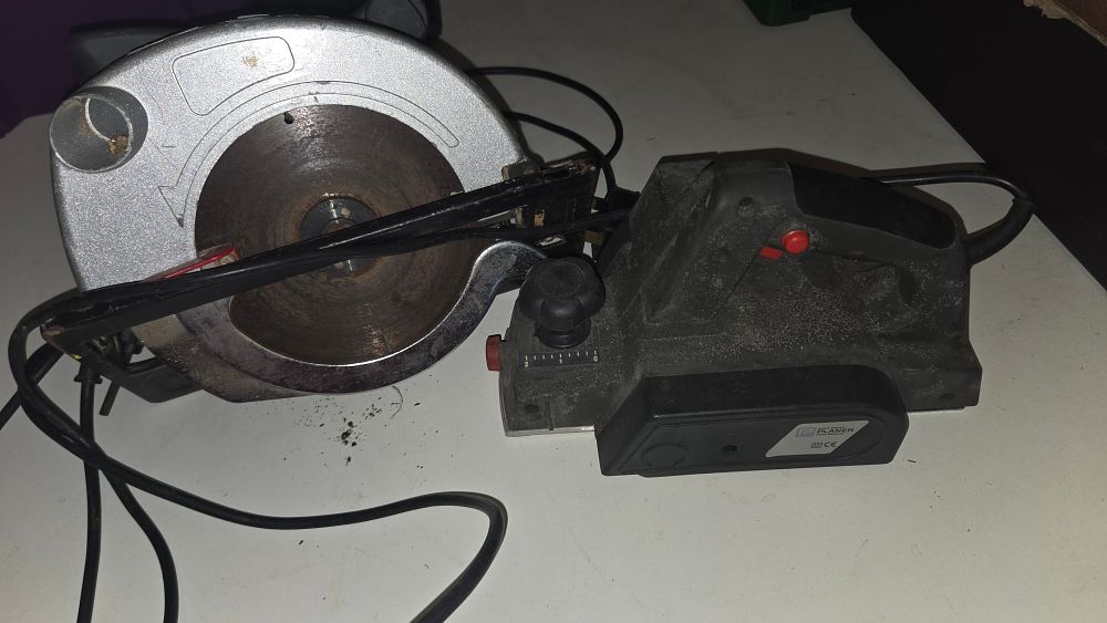 Lot 297 – Two handheld corded electric power tools comprising a circular saw and a planer