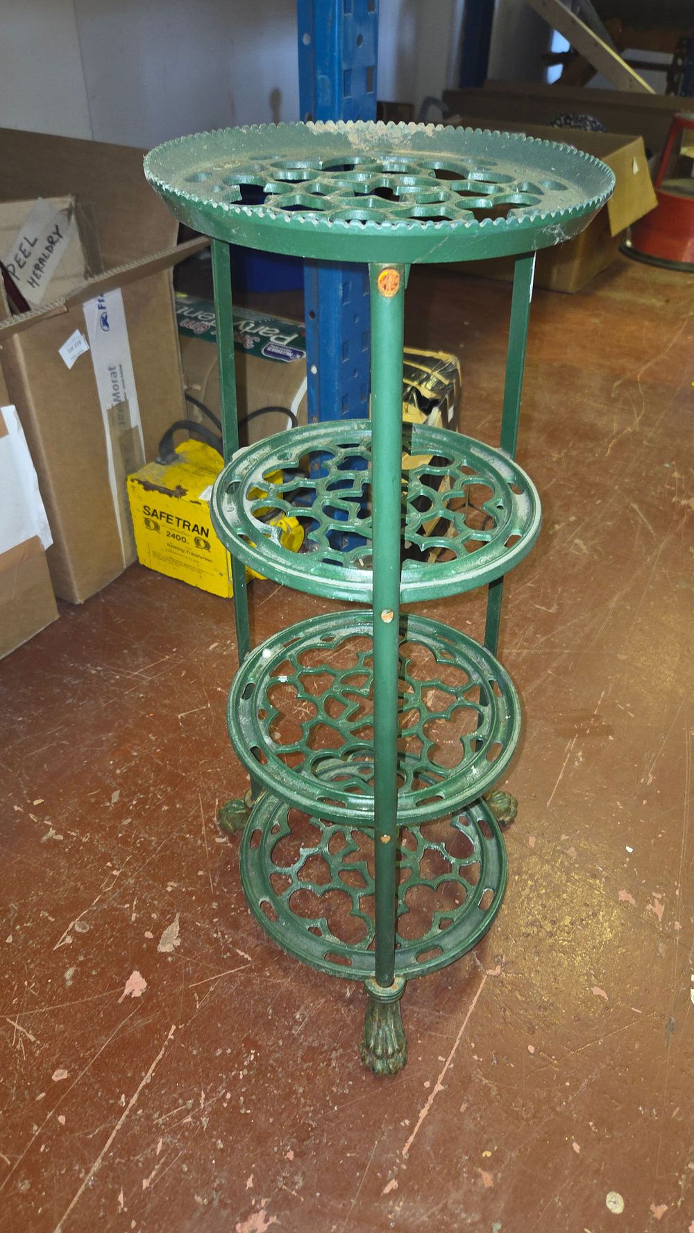 Lot 322 – A Four-Tier Cast-Iron Plant Stand in the Victorian Style