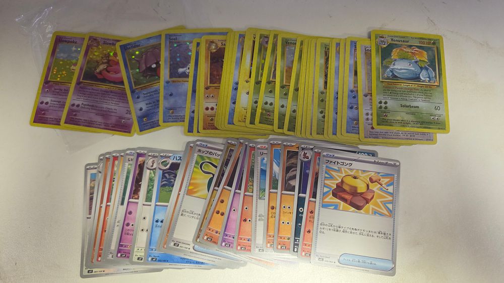 Lot 348 – A Collection of Reissue Pokémon Trading Cards Including Base Set Venusaur Holo