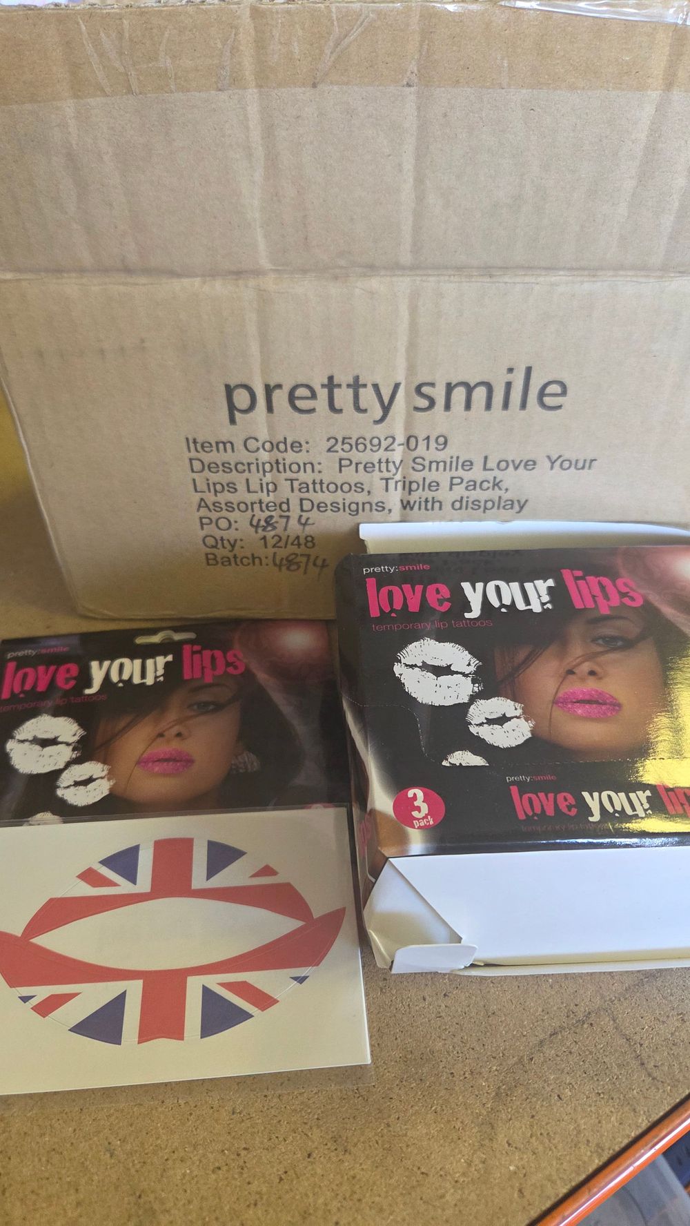 Lot 273 – A Bulk Collection of Pretty Smile Love Your Lips Temporary Lip Tattoos