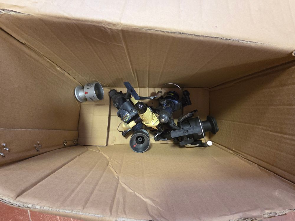 Lot 403 – A Collection of Spinning Fishing Reels and Components