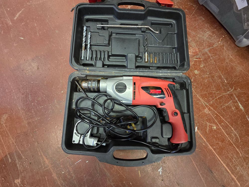 Lot 408 – XTREME Corded Electric Hammer Drill with Accessories and Carry Case working order