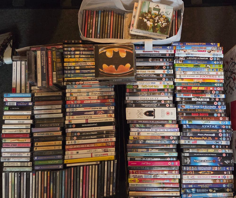 Lot 448 – A Large Collection of Mixed Media Entertainment Including DVDs, CDs, and Cassette Tapes