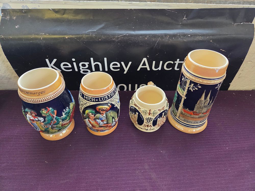 Lot 610 – A Collection of German Ceramic Relief Steins and Mugs