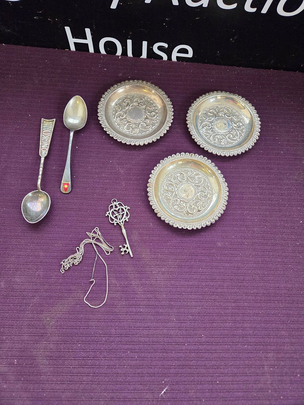 Lot 616 – A Collection of Silver 925 items Including Souvenir Spoons and Repoussé Dishes 128g