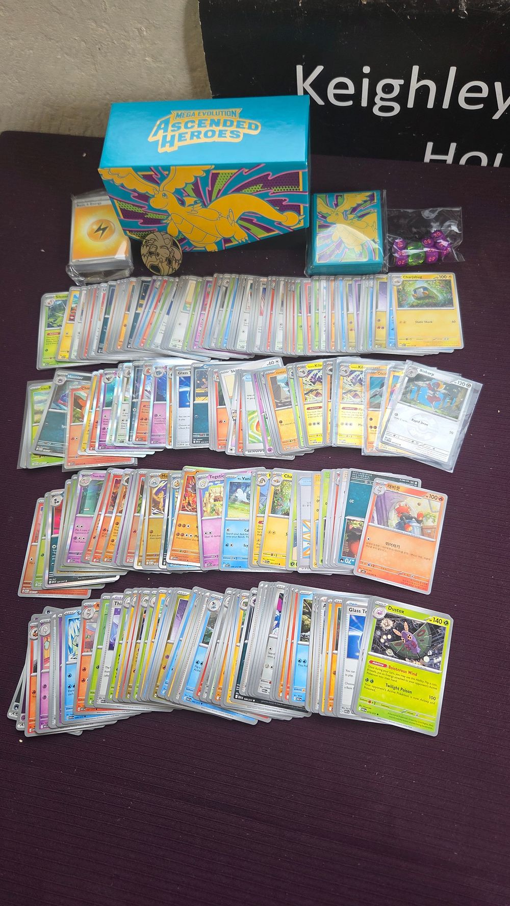 Lot 169 – A Collection of Pokémon Trading Cards and Dragonite Themed Accessories