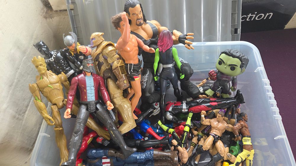 Lot 179 – A Collection of Assorted Marvel and WWE Wrestling Action Figures and a Vinyl Figure