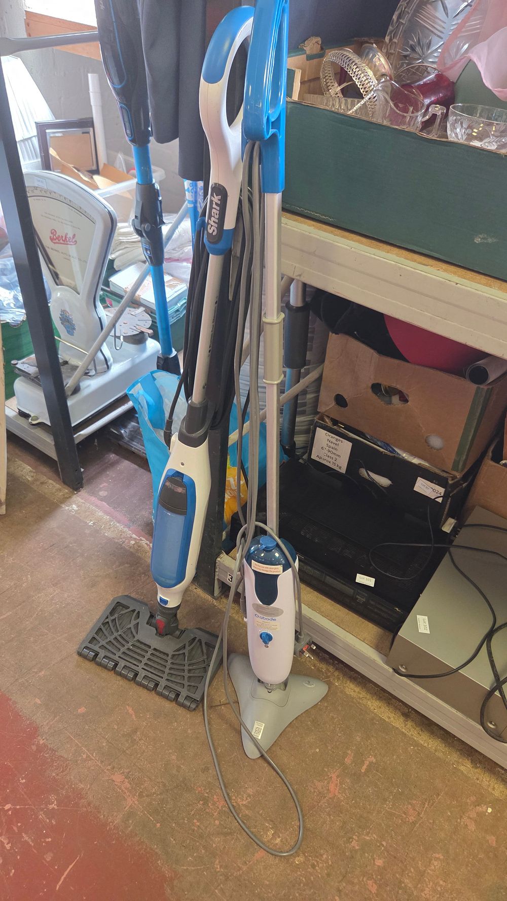 Lot 213 – Two Steam Mops. Including Shark