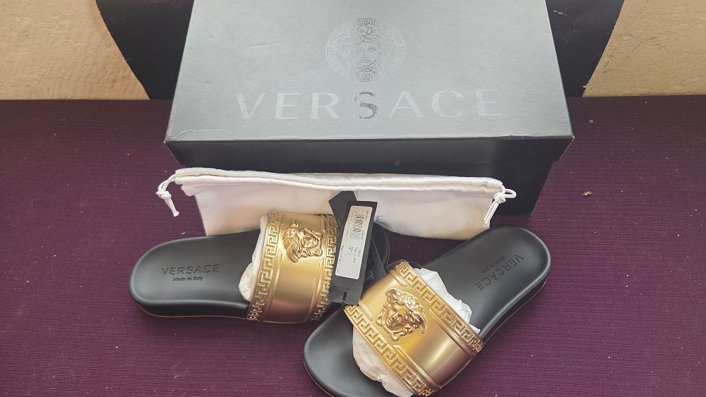 Lot 231 – A Pair of Versace Palazzo Medusa Gold and Black Pool Slides Size 6