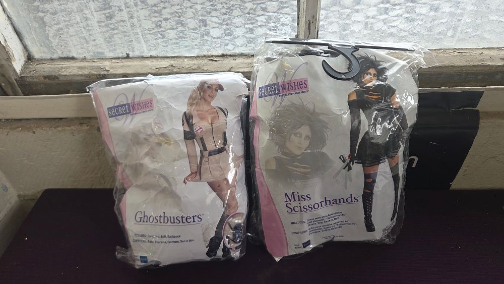 Lot 236 – Two Licensed Secret Wishes Adult Costumes, Ghostbusters and Miss Scissorhands